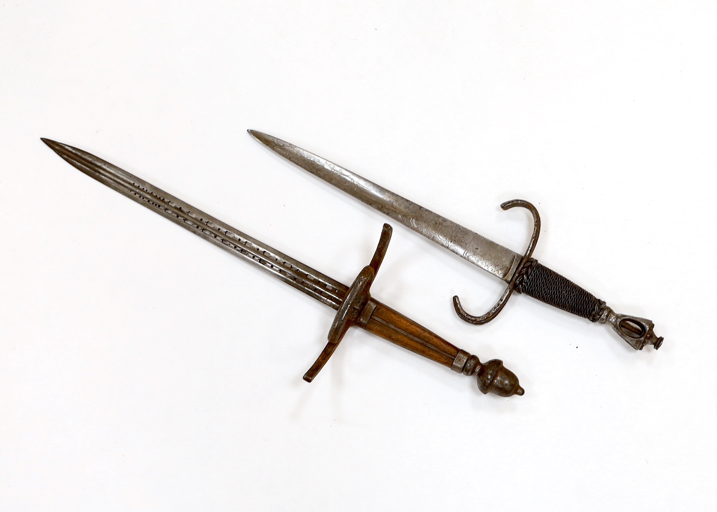 A reproduction stiletto and dagger, stiletto with engraved steel blade, steel pommel and quillon, and wire grip, longest 35.5cm